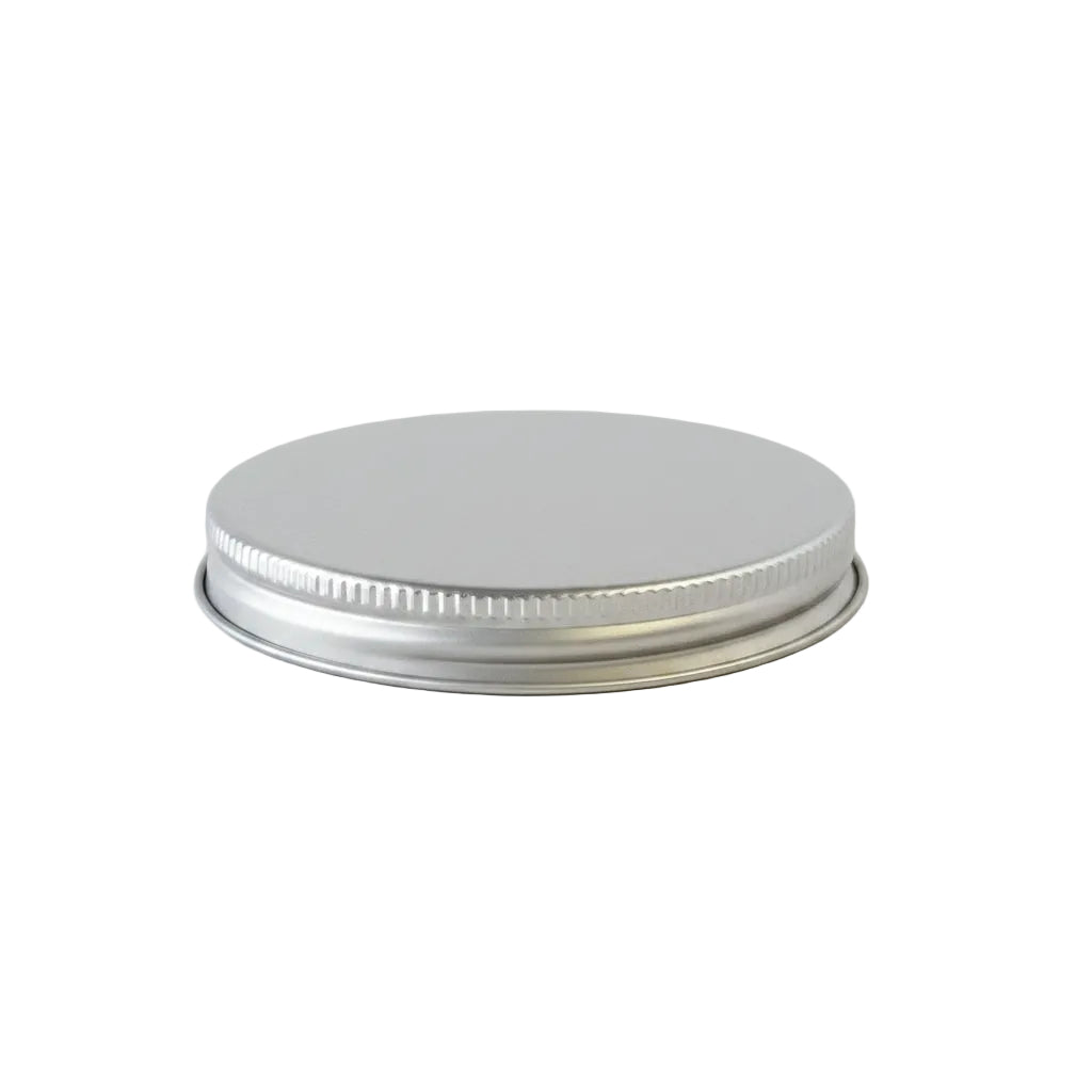 Silver Metal jar lid on a white background