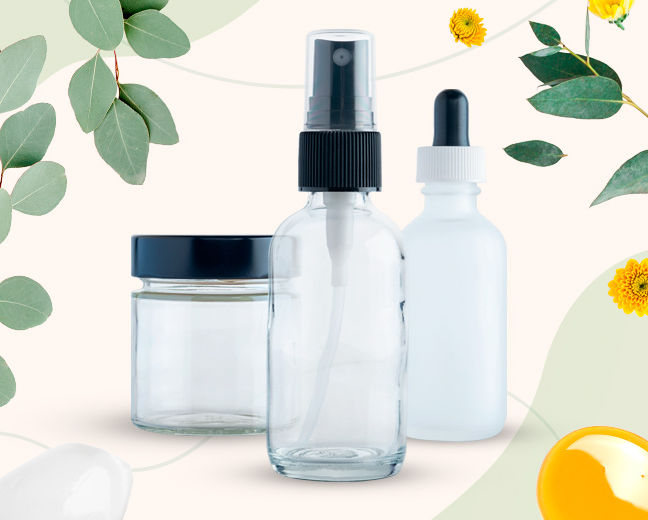 Clear 1oz frosted glass Boston round bottle with 20/400 top, ideal for packaging liquids or cosmetics.
