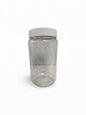 Clear plastic jar with a white lid on a white background