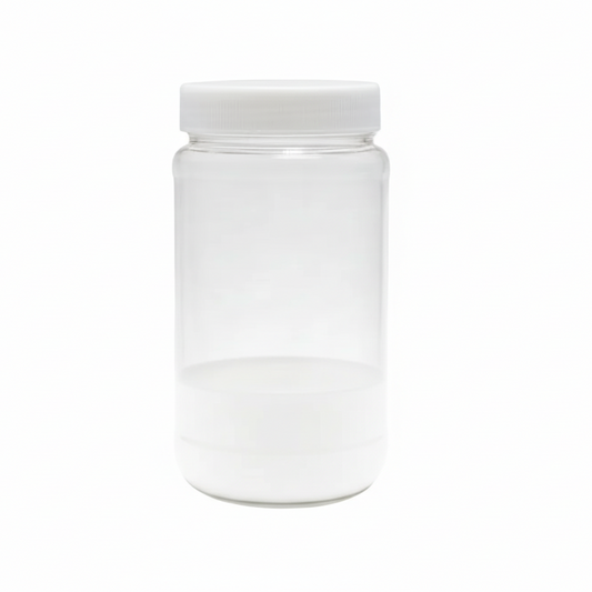 Clear plastic jar with a white lid on a white background